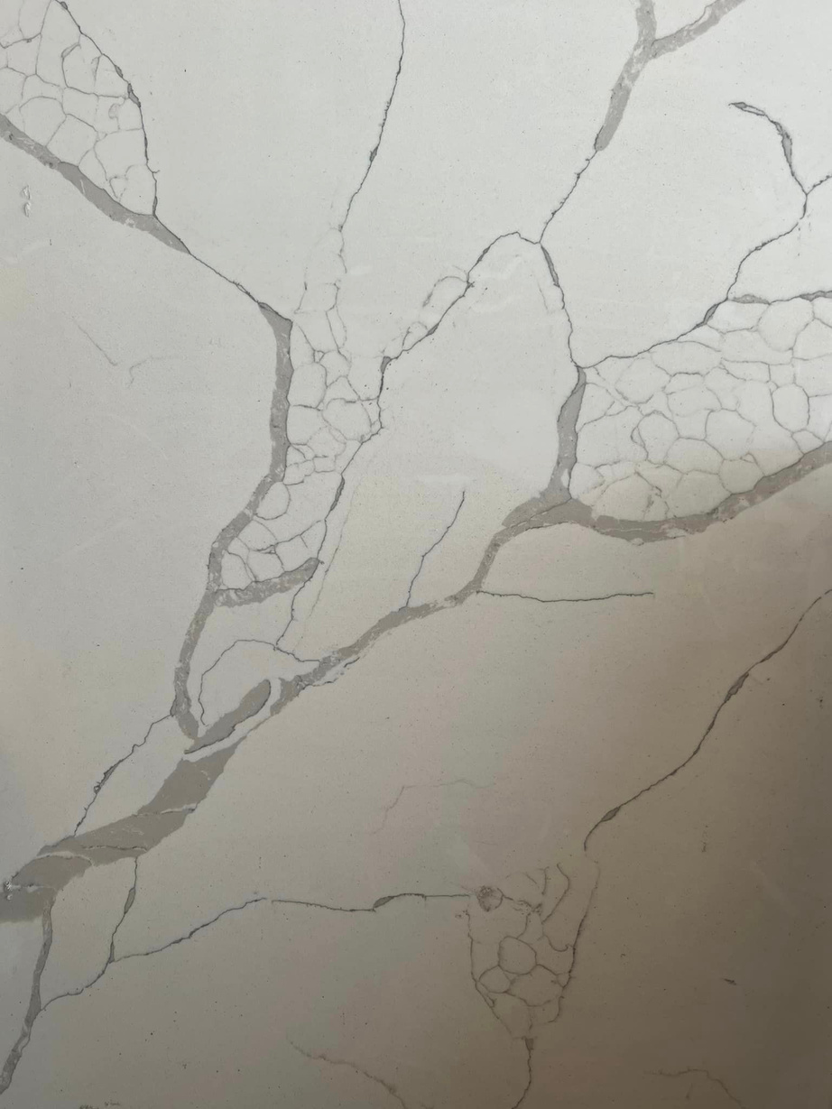 melbourne fl granite countertops a white marble slab with cracks on it